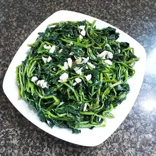 Cách Xào Rau Muống Với Tỏi Xanh Ngon
